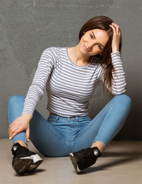 Download Legs Spread In Blue Jeans Wallpaper | Wallpapers.com