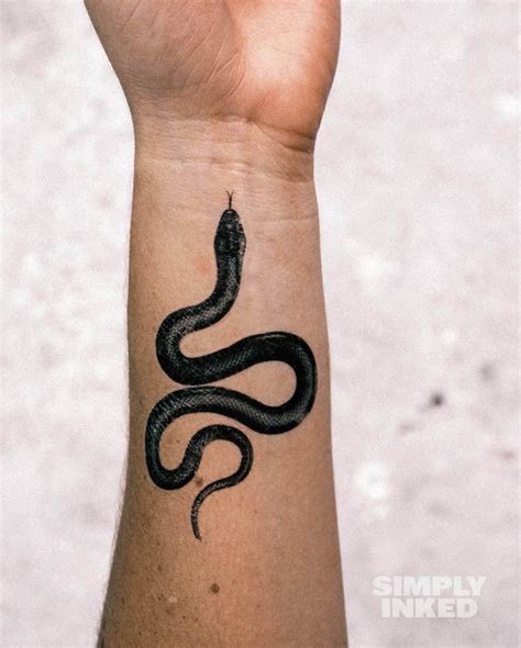 Simple snake tattoo designs photos