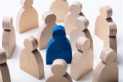 digging press wooden figures  blue human figure  desk