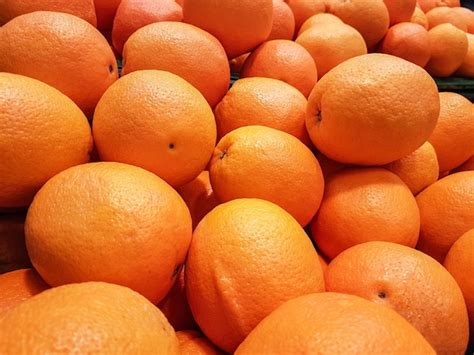 premium photo closeup   fresh orange fruits  sale