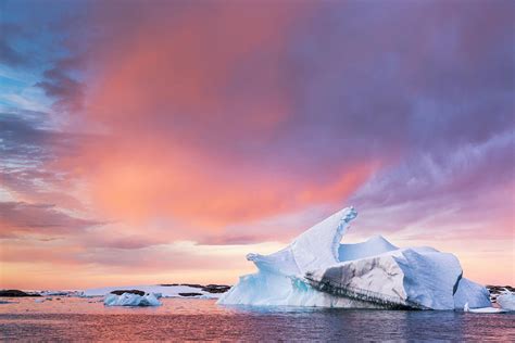 Sunset Sky Over Floating Iceberg Photograph by Patrick J Endres ...