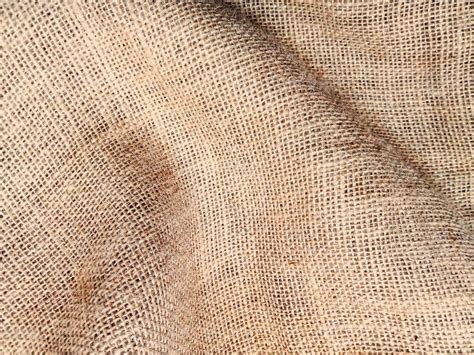 Download Burlap fabric background with an aged, weathered look ...