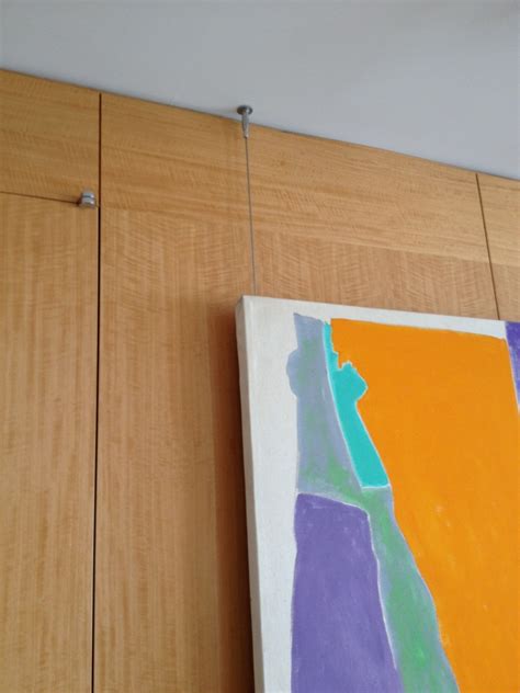 Hanging Art from the Ceiling - ilevel