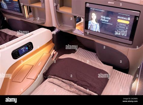 Business class seat at the Business Class cabin of an Airbus' A350-900 ...