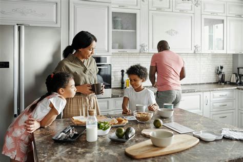 Family Making Breakfast in the Kitchen · Free Stock Photo