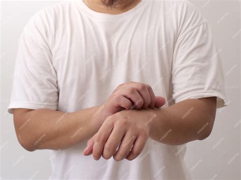 premium photo anonymous person scratching skin due  annoying itch