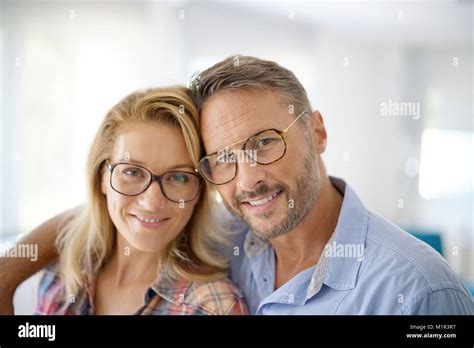 Portrait of mature couple wearing eyeglasses Stock Photo - Alamy