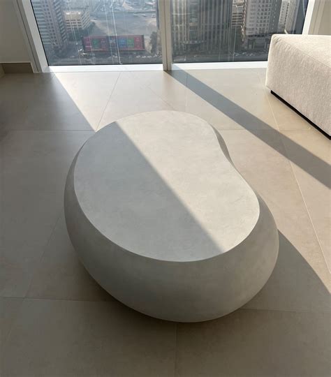 Crafted this pebble coffee table in micro cement—minimalist style with ...