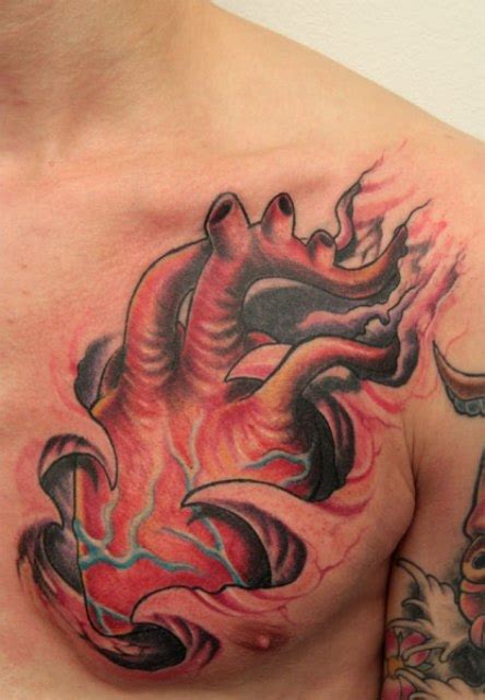 Human Heart Tattoo On Chest | Tattoo Designs, Tattoo Pictures