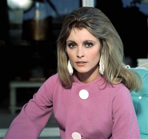 Download Sharon Tate Pink Coat Wallpaper | Wallpapers.com