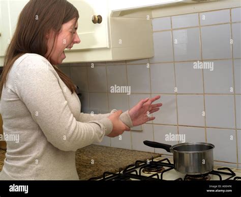 burn hand stove  res stock photography  images alamy