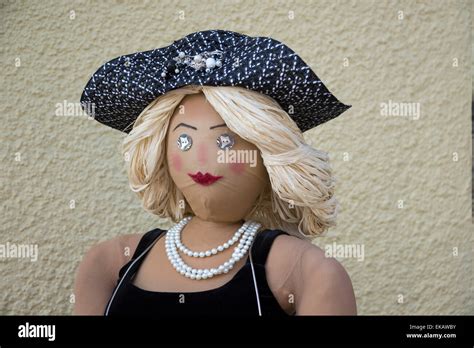 Attractive classy lady scarecrow at scarecrow festival Stock Photo - Alamy
