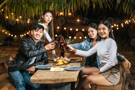 Portrait of Happy Asian friends having dinner party together - Young