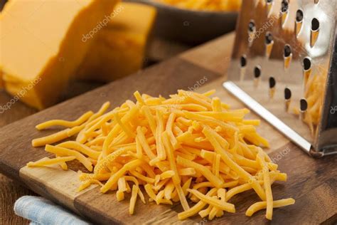 Organic Shredded Sharp Cheddar Cheese — Stock Photo © bhofack2 #40435167