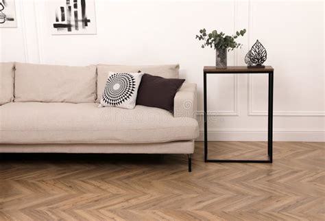 Modern Living Room with Parquet Flooring and Stylish Furniture Stock ...