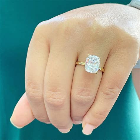 yellow gold cushion cut engagement rings