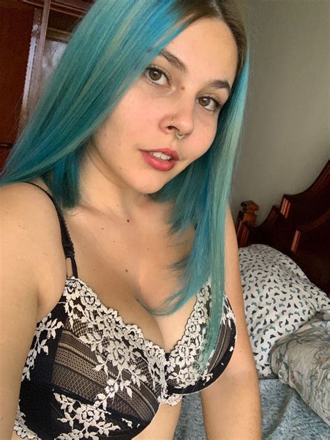 I don't know what I love more my huge boobs in this bra or my new hair