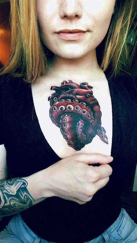 Octopus heart chest tattoo. | Chest tattoos for women, Girl tattoos